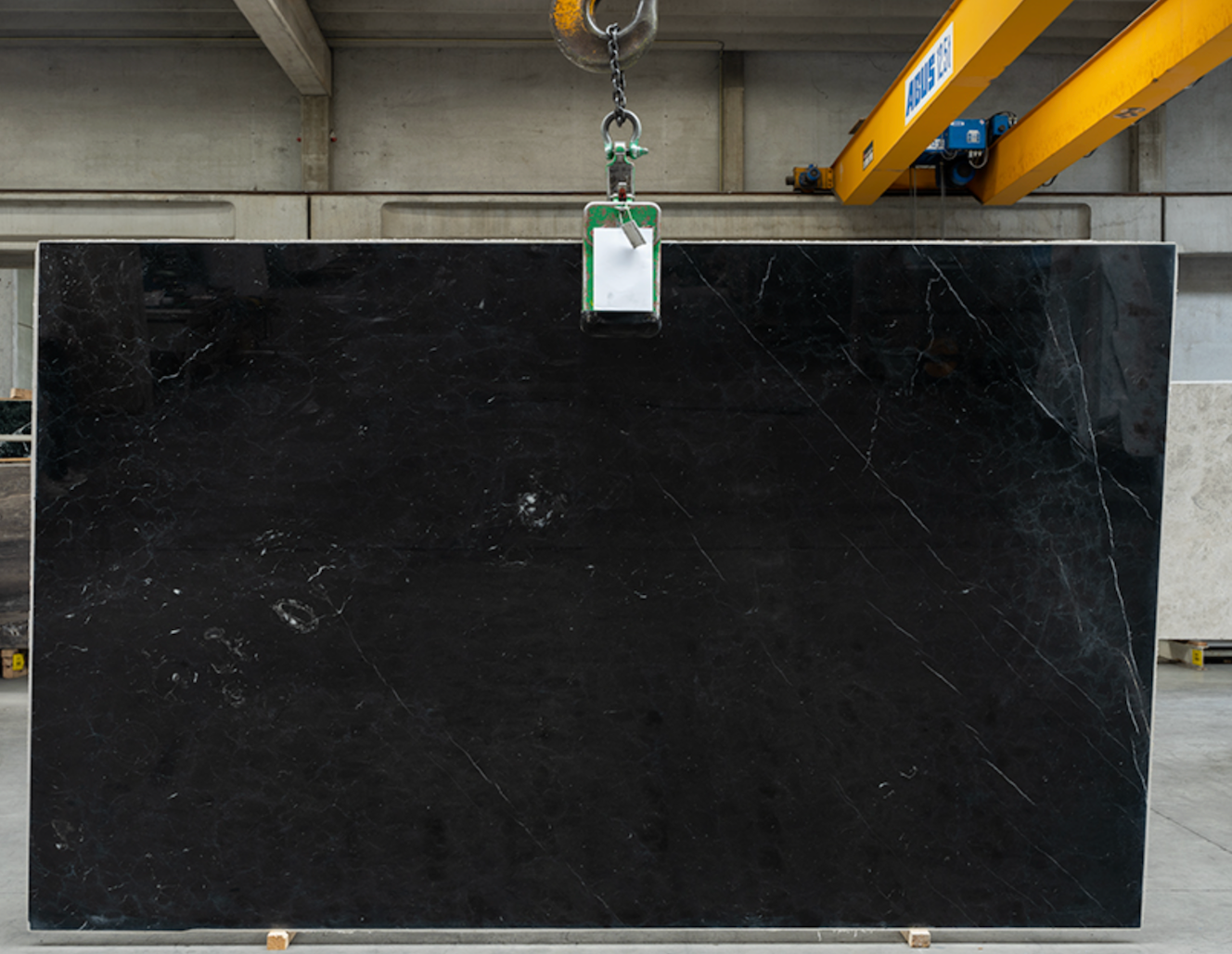 Nero Marquina Dining Table with X - Shaped Gold Base - Luxury Quarry